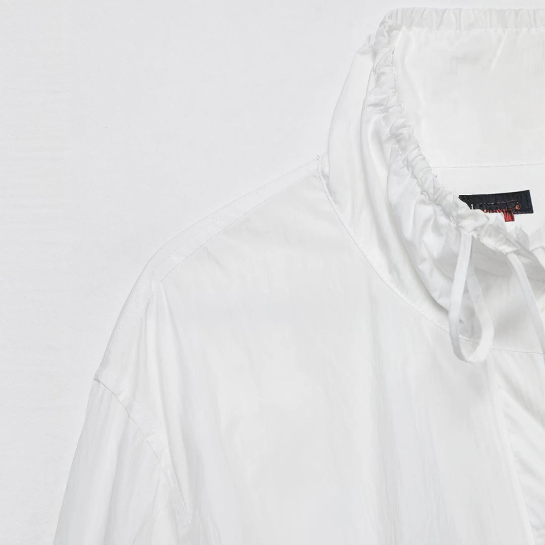Damen Ultralight Cropped Anorak mit Tunnelzugtaillierung, Ballonärmeln und hohem Stehkragen Nord Taschen