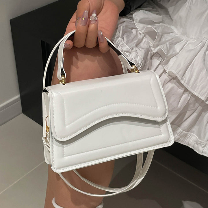 Damen elegante Handtasche mit geschwungenem Design Nord Taschen