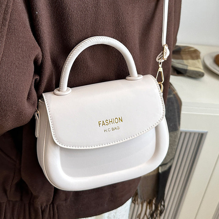 Damen Henkeltasche mit modernem Klappverschluss und eleganten Details Nord Taschen