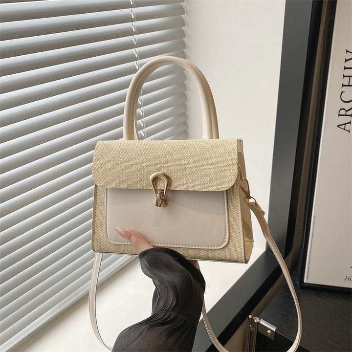Damen elegante Umhängetasche mit strukturiertem Obermaterial und goldfarbener Verschlussmechanik Nord Taschen
