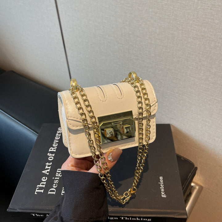 Damen elegante Mini-Handtasche mit goldener Verschlussmechanik Nord Taschen