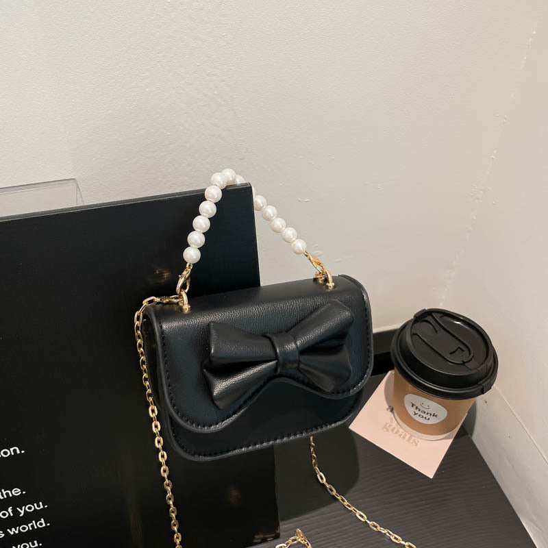 Damen Handtasche mit elegantem Schleifendetail und Perlenhenkel Nord Taschen