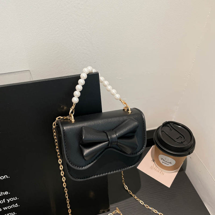 Damen Handtasche mit elegantem Schleifendetail und Perlenhenkel Nord Taschen