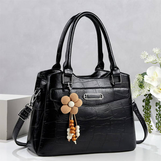 Damen Handtasche mit stilvollem Kroko-Design und abnehmbarem Blumenanhänger Nord Taschen