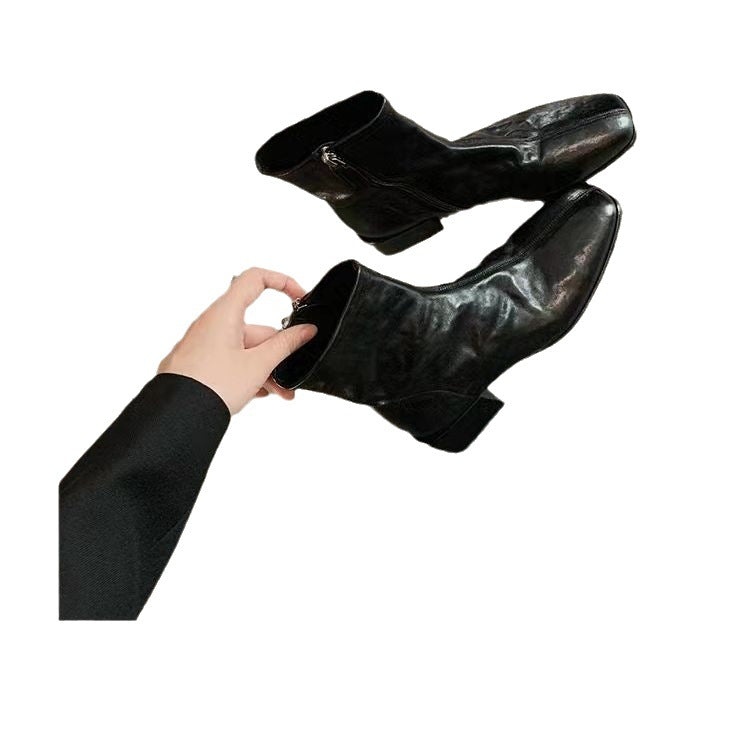 Damen Glattleder-Stiefelette mit schlanker Socken-Passform, innenliegendem Reißverschluss und sculpted Blockabsatz Nord Taschen