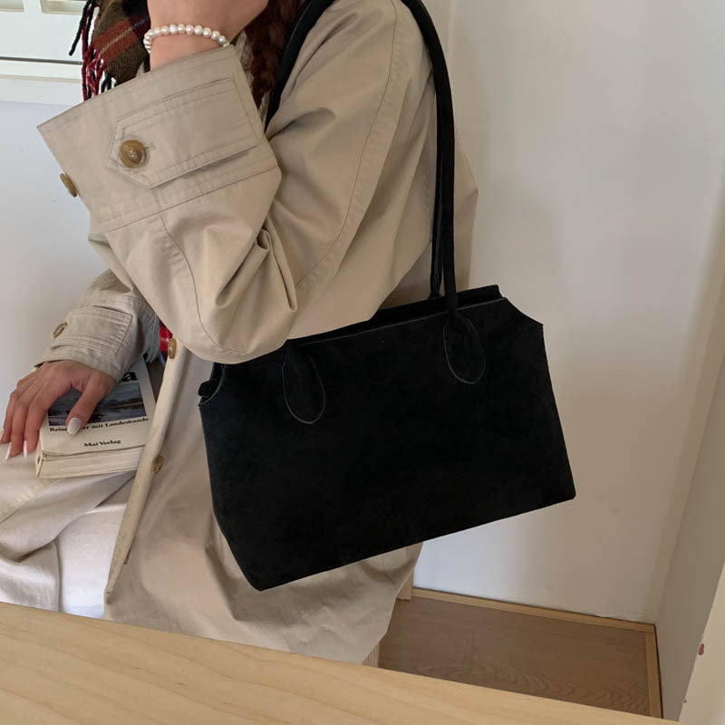 Damen elegante Handtasche aus weichem Kunstleder Nord Taschen