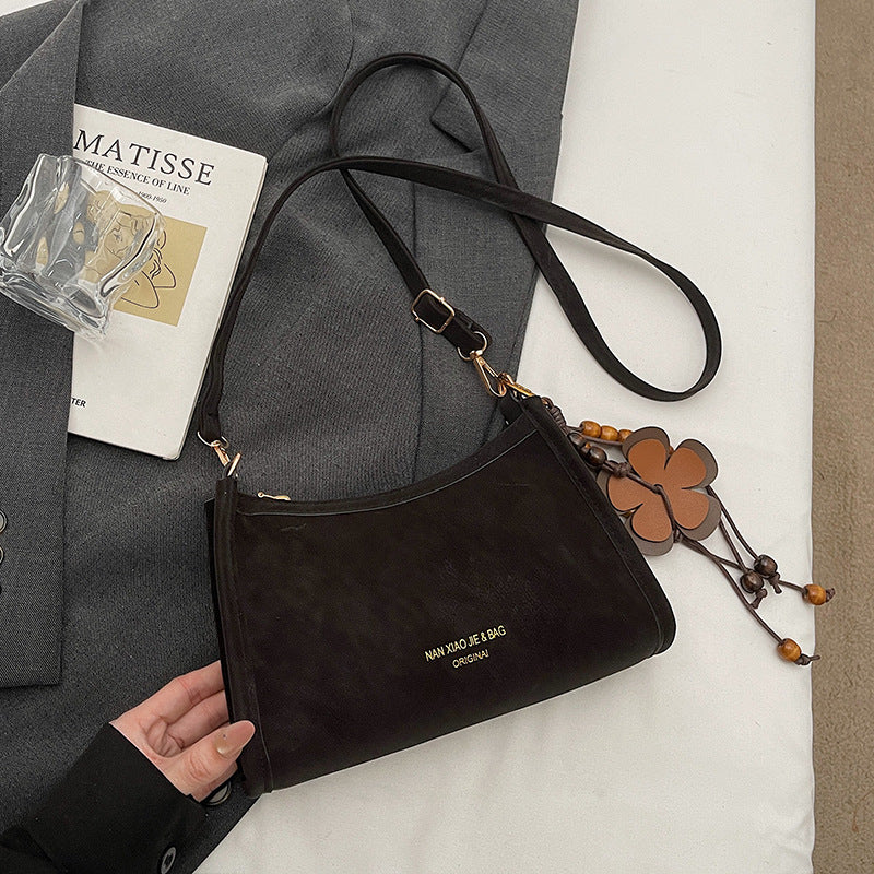Damen Umhängetasche aus hochwertigem Kunstleder mit elegantem Reißverschluss Nord Taschen