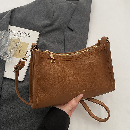 Damen Umhängetasche aus hochwertigem Kunstleder mit elegantem Reißverschluss Nord Taschen