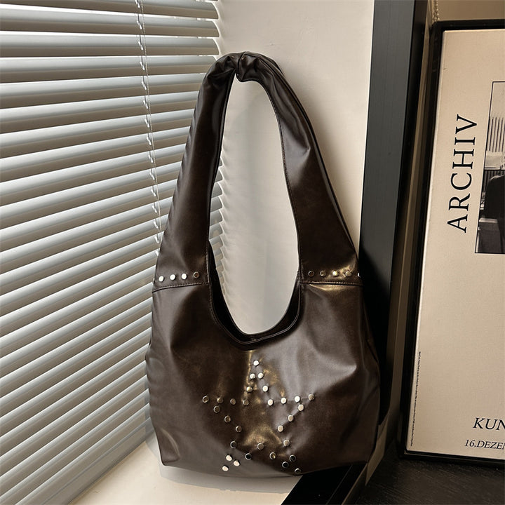 Damen Hobo-Tasche mit eleganter Sternenverzierung und strukturiertem Kunstleder Nord Taschen