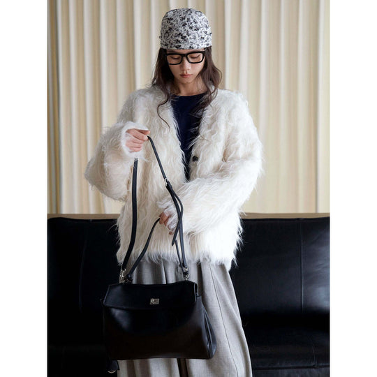 Damen Voluminöse Kapuzen‑Fellmütze aus Kunstfell mit Oversize‑Silhouette Nord Taschen