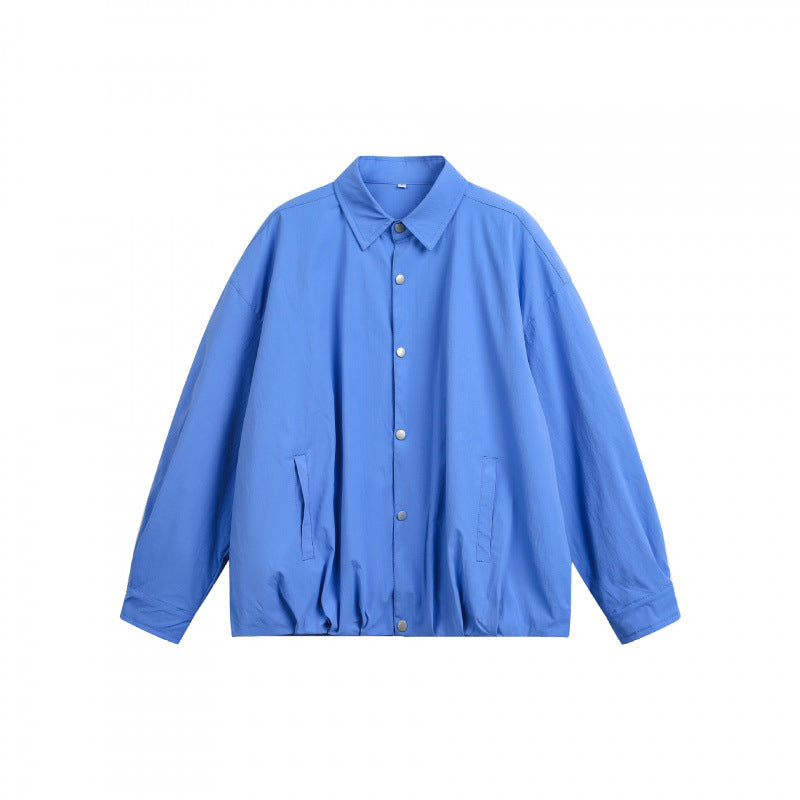 Unisex Boxy-Hemdjacke mit Druckknopfleiste, Hemdkragen und elastischem Saum Nord Taschen