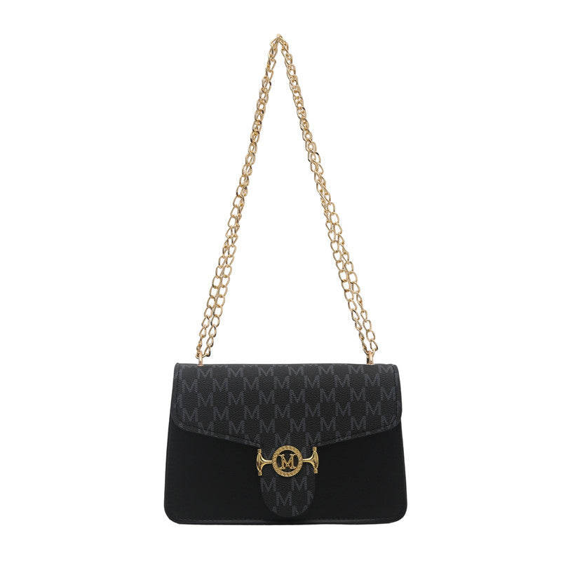 Damen Umhängetasche mit goldener Kettenverzierung und Designer-Logo Nord Taschen