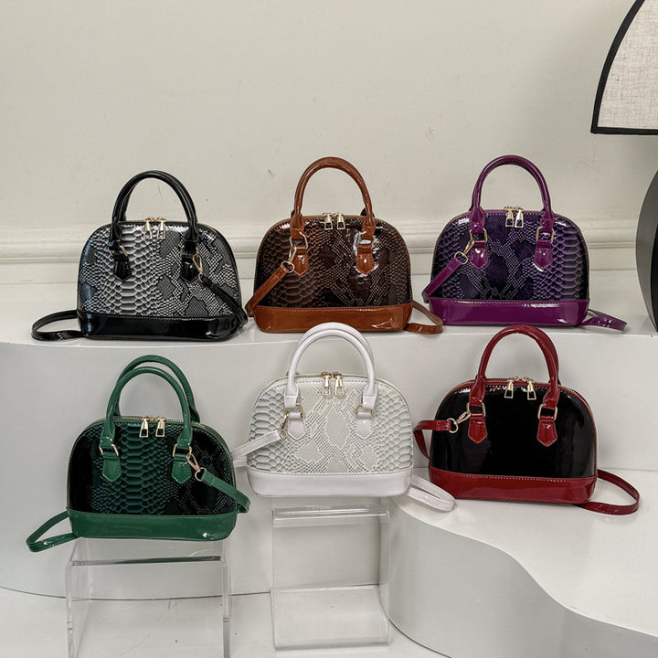 Damen elegante Handtasche im stilvollen Schlangenleder-Look Nord Taschen