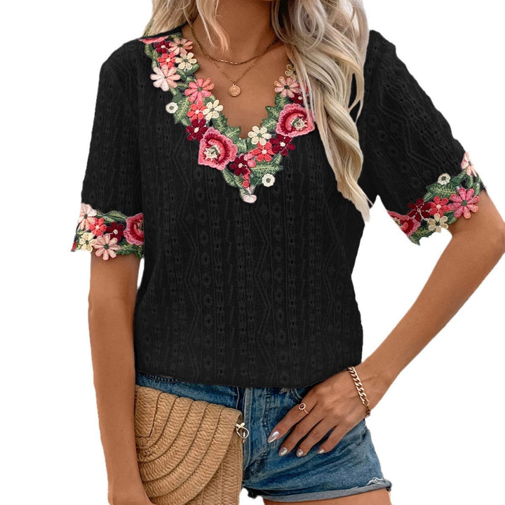 Damen Bluse mit floralen Stickereien und luftigen Ärmeln