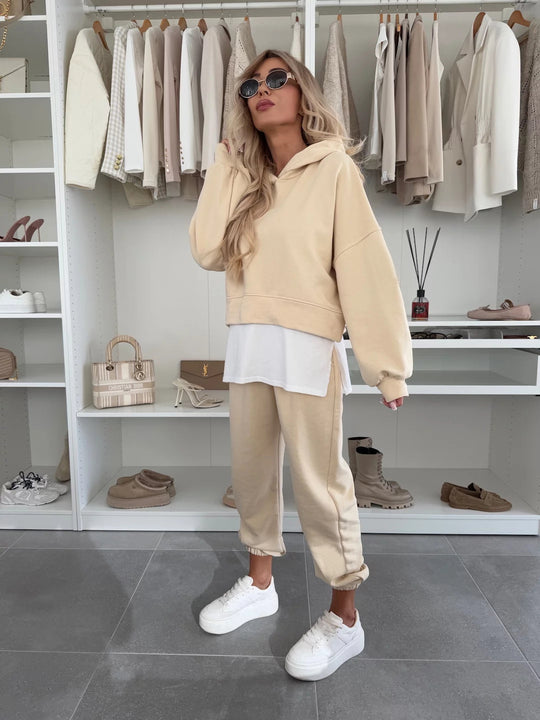 Damen Cropped-Hoodie-Lounge-Set mit asymmetrischem Saum, voluminösen Raglanärmeln und gekrempelter Jogginghose Nord Taschen