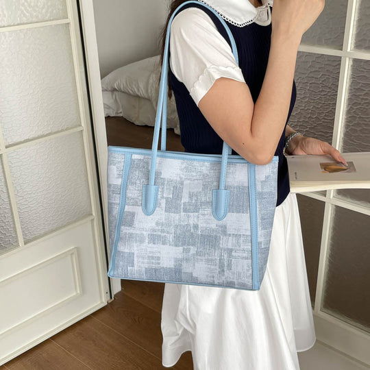 Damen Tragetasche mit strukturiertem Kunstleder und raffinierten Details Nord Taschen
