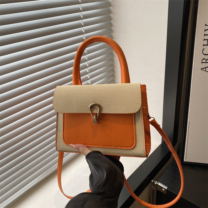 Damen elegante Umhängetasche mit strukturiertem Obermaterial und goldfarbener Verschlussmechanik Nord Taschen