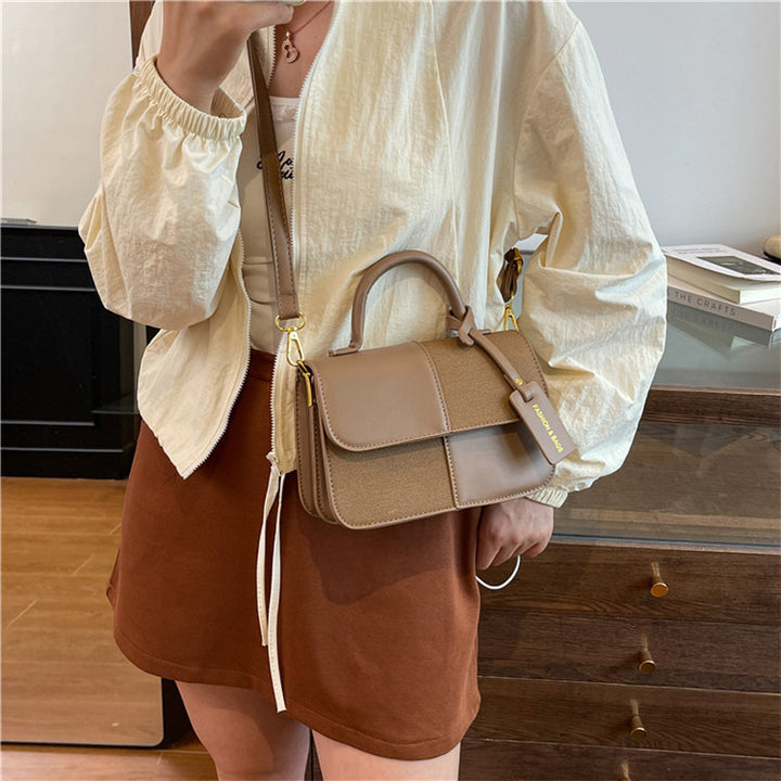 Damen elegante Handtasche mit strukturierten Details Nord Taschen