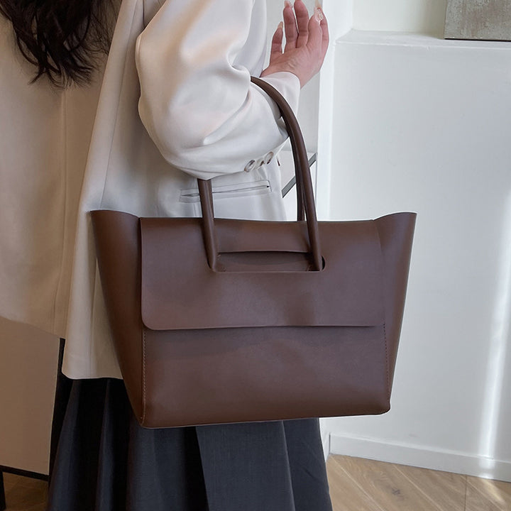 Damen elegante Handtasche aus hochwertigem Kunstleder mit raffiniertem Verschluss Nord Taschen