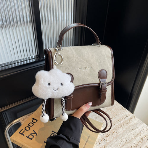 Damen Umhängetasche mit stilvollem Design und praktischem Schlüsselanhänger | Nord Taschen