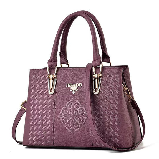 Damen elegante Handtasche mit aufwendigem gewebtem Design und kontrastierender Verzierung Nord Taschen