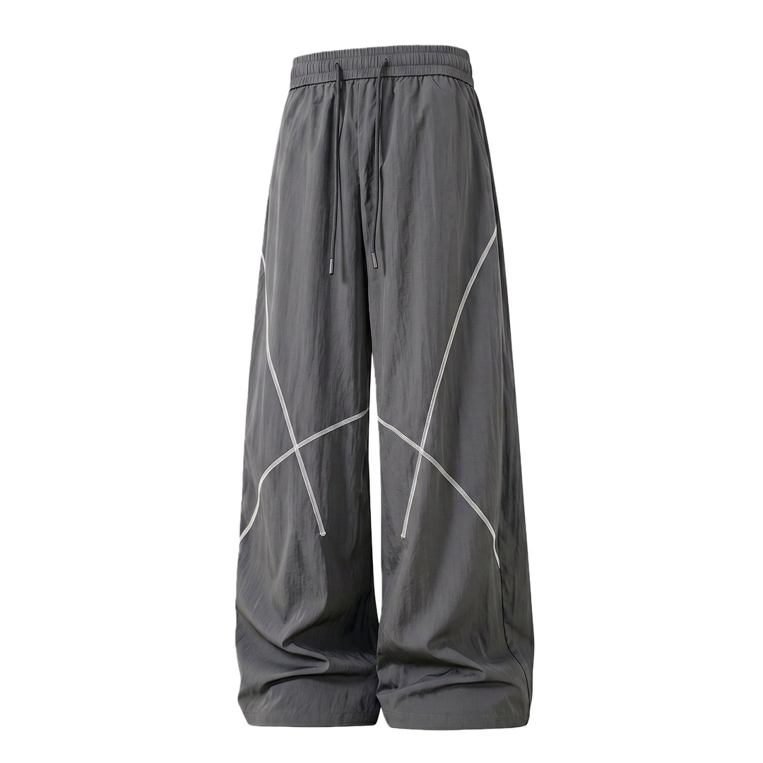 Herren Weite Funktions-Nylonhose mit Kordelbund, reflektierenden Nahtdetails & lässiger Baggy‑Silhouette Nord Taschen