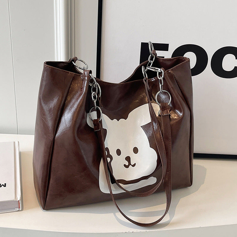 Damen Umhängetasche aus hochwertigem Kunstleder mit verspieltem Tierdesign Nord Taschen