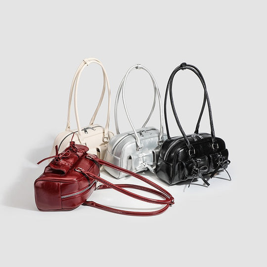 Damen Handtasche mit dekorativen Schleifen und praktischer Innenaufteilung Nord Taschen