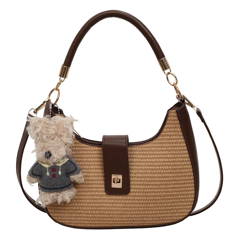 Damen Handtasche mit raffiniertem geflochtenem Design und verspieltem Anhänger Nord Taschen