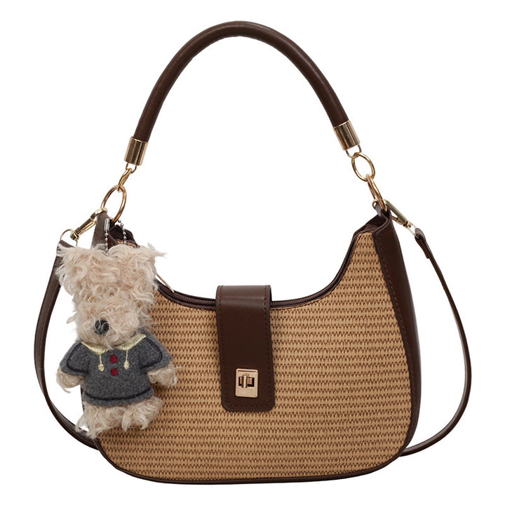 Damen Handtasche mit raffiniertem geflochtenem Design und verspieltem Anhänger Nord Taschen