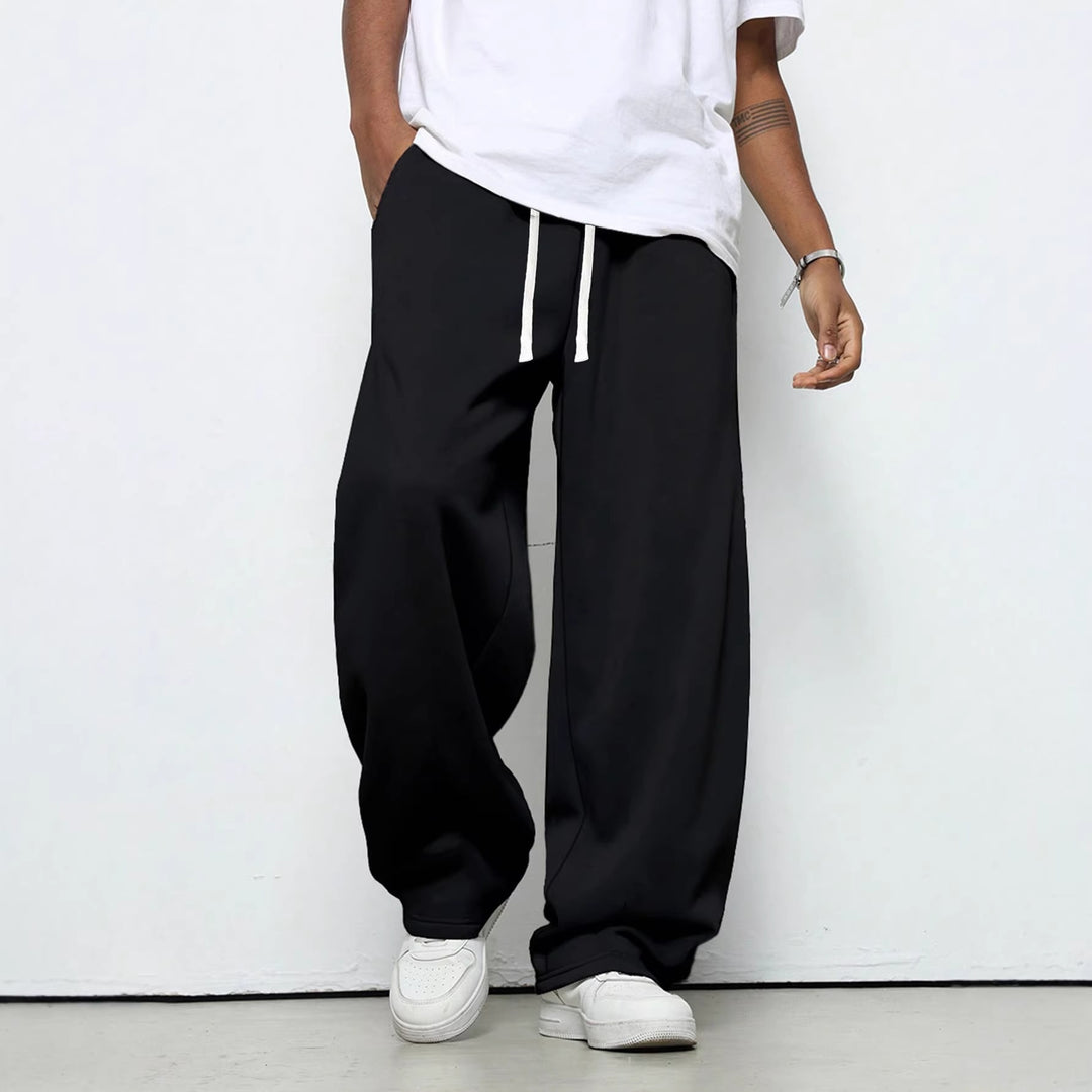Herren Baggy-Jogginghose im Urban-Utility-Stil mit extra weitem Bein und sichtbarem Kordelzug Nord Taschen