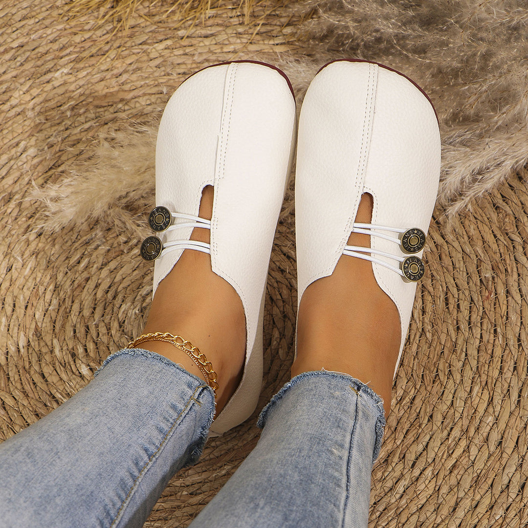 Damen  flache Slipper-Pantoletten aus Wildlederoptik mit elastischer Schnürung und dekorativem Zierknopf Nord Taschen
