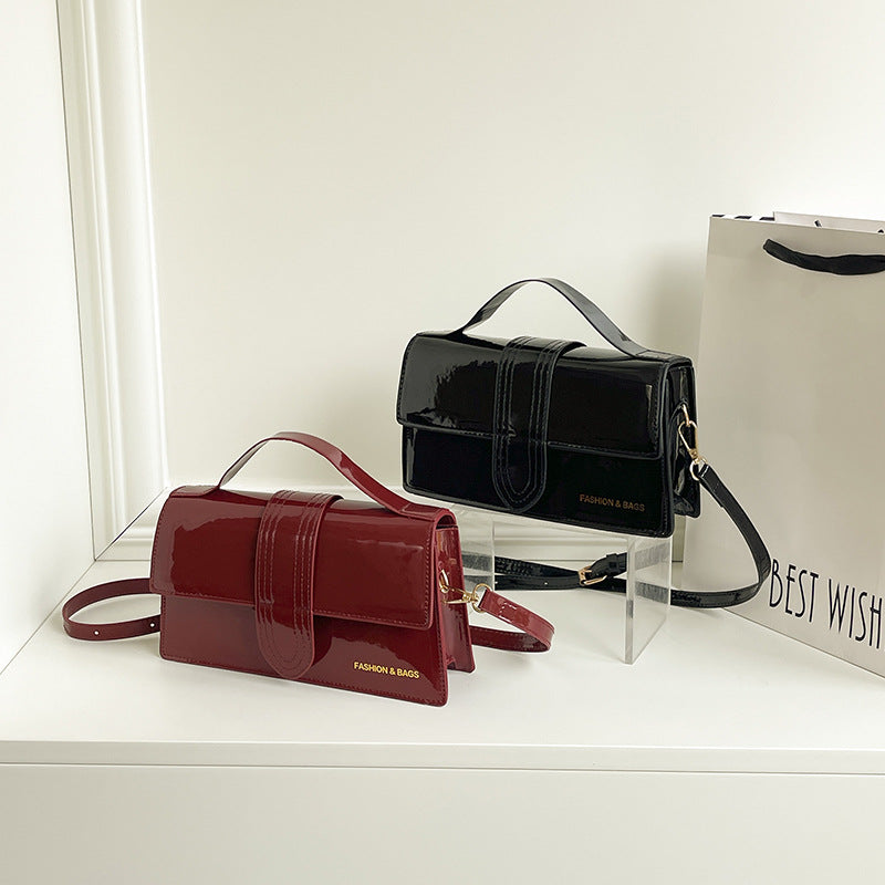 Damen elegante Lackleder-Handtasche mit praktischer Umhängemöglichkeit Nord Taschen