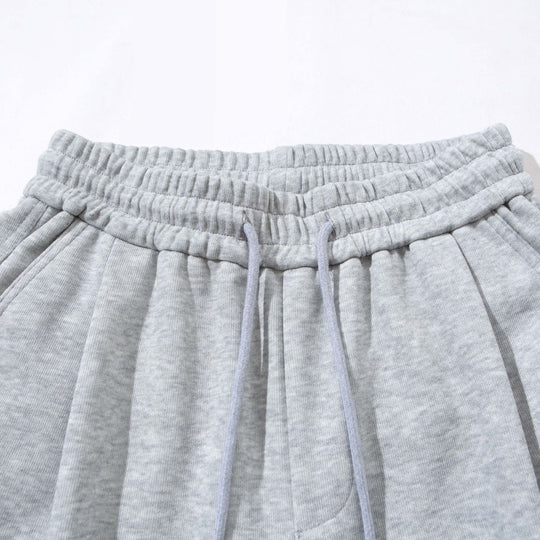 Damen Weite Cropped-Sweathose mit Tunnelzug, Cargo-Taschen und Reißverschluss-Details Nord Taschen