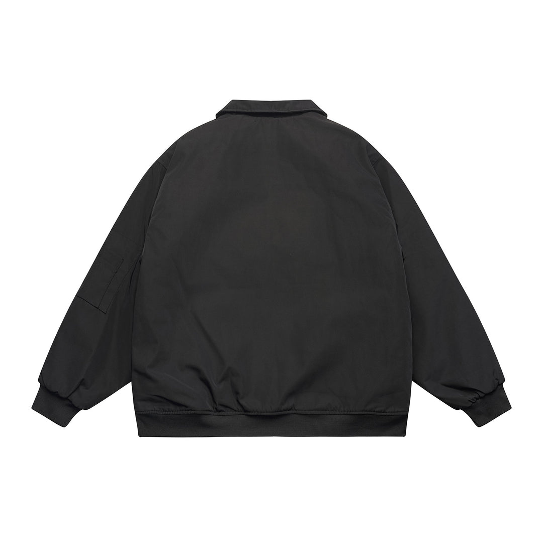 Unisex Kurz geschnittene Boxy‑Bomberjacke mit gesteppter Kontrastfutter-Innenseite, Utility‑Pattentaschen und geripptem Saum Nord Taschen