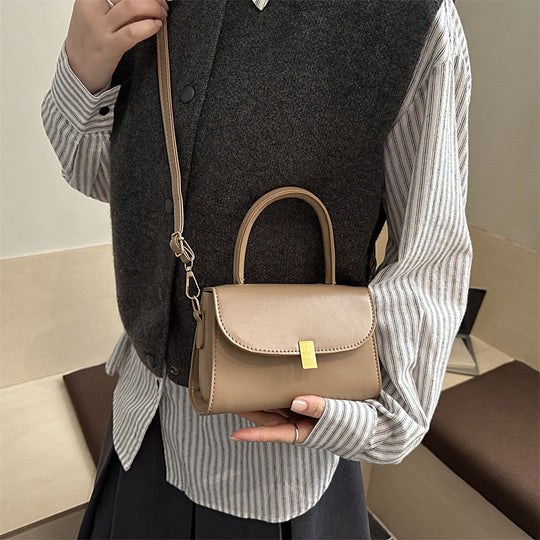 Damen-Handtasche mit abnehmbarem Schulterriemen und eleganter Verschlussmechanik Nord Taschen