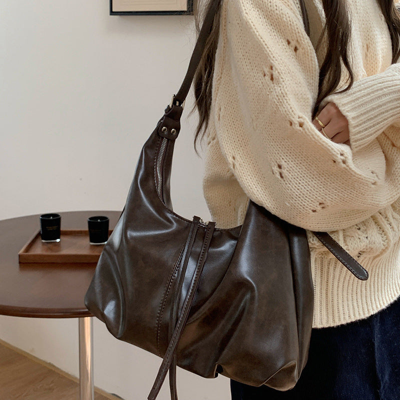 Damen Hobo-Tasche mit modernem, geschwungenem Design und praktischen Reißverschlussfächern Nord Taschen