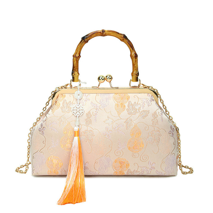 Damen elegante Handtasche mit Bambusgriffen und floralem Design Nord Taschen