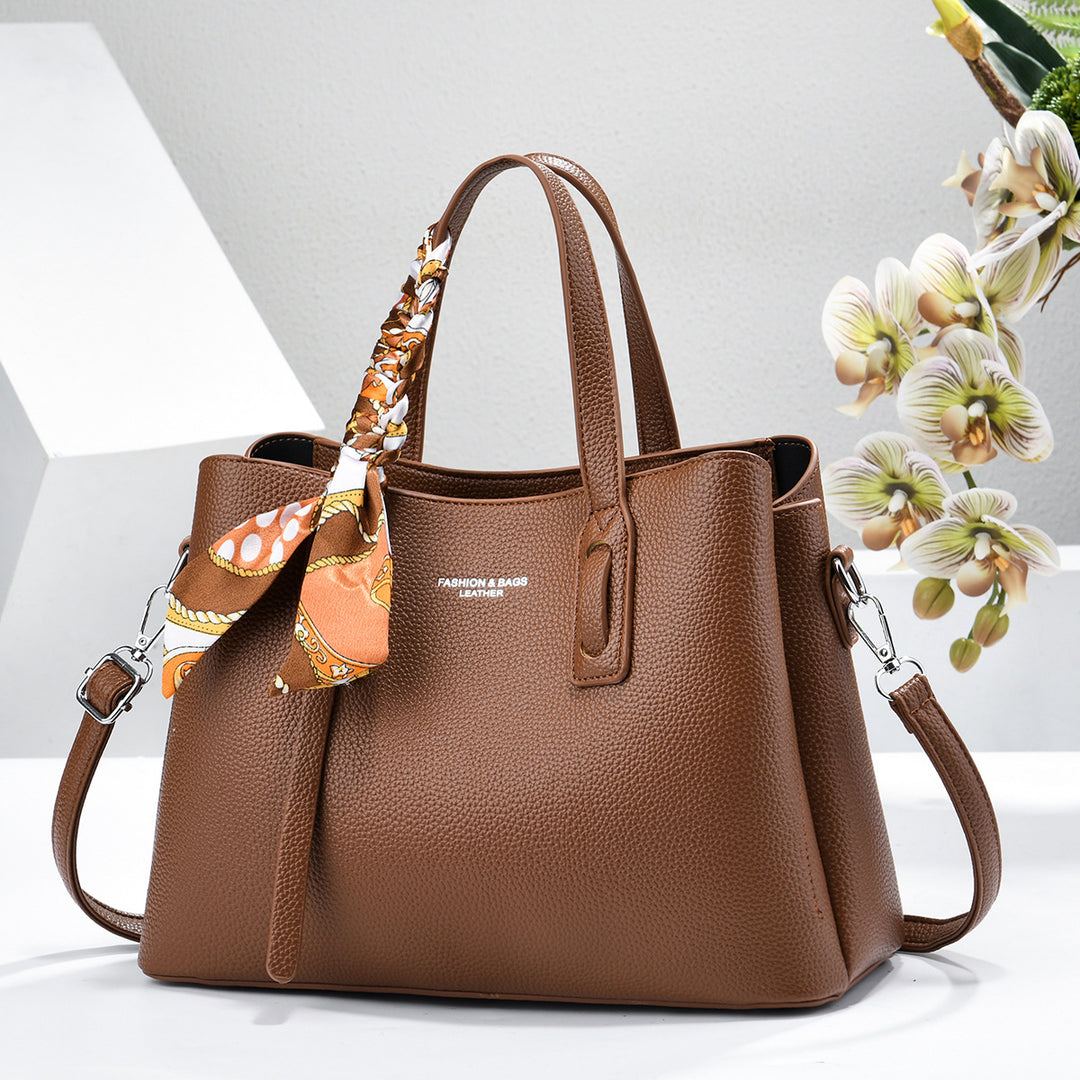 Damen elegante Handtasche mit dekorativem Schal Nord Taschen