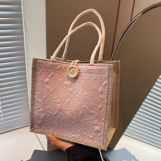 Damen Jute-Umhängetasche mit floralem Design und praktischem Buttonverschluss Nord Taschen