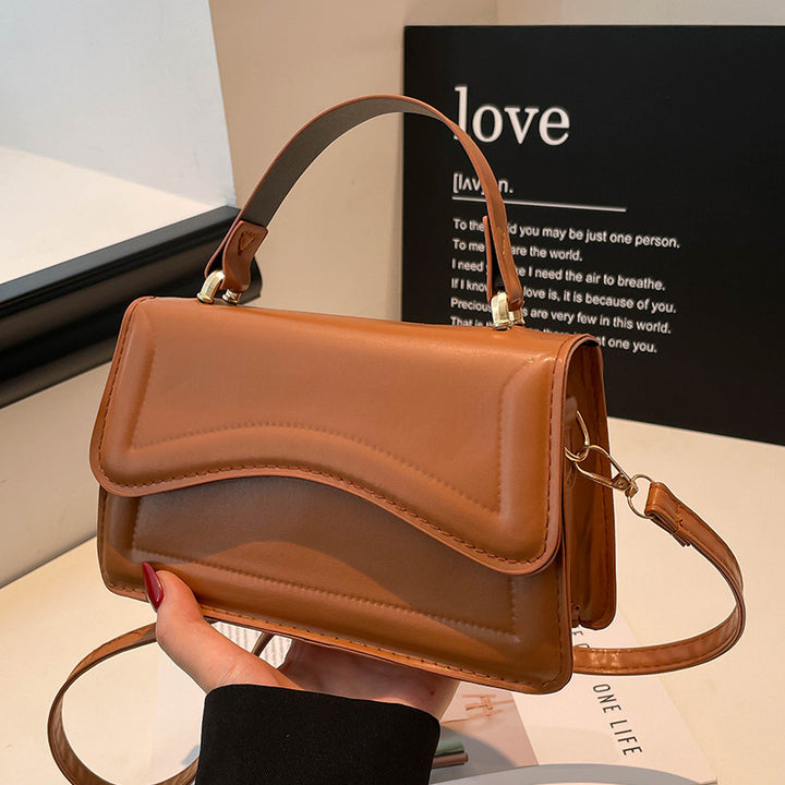 Damen elegante Handtasche mit geschwungenem Design Nord Taschen
