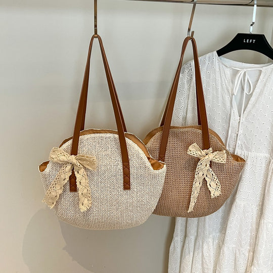 Damen stilvolle Handtasche aus geflochtenem Material mit charmanten Details Nord Taschen