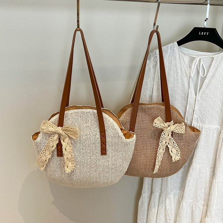 Damen stilvolle Handtasche aus geflochtenem Material mit charmanten Details Nord Taschen