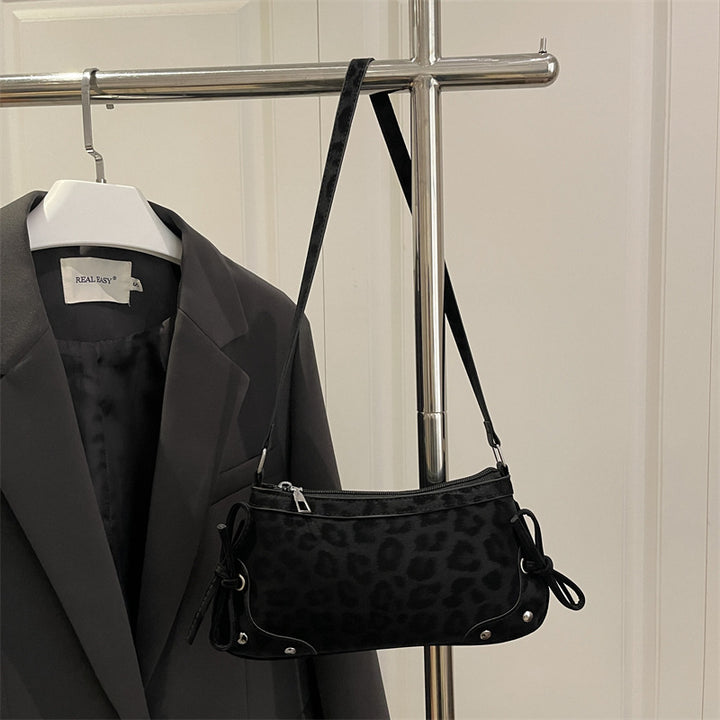 Damen Umhängetasche mit Leopardenmuster und dekorativen Schleifendetails Nord Taschen