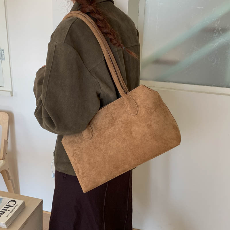 Damen elegante Handtasche aus weichem Kunstleder Nord Taschen