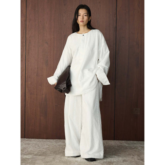 Damen Oversized strukturierte Longbluse mit Rundhals und verlängertem Saum Nord Taschen