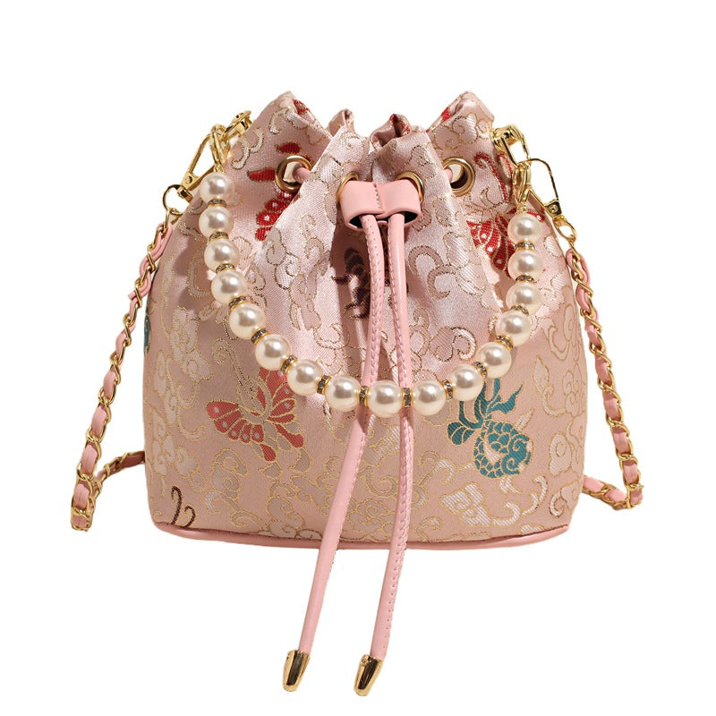 Damen Umhängetasche mit luxuriösem Perlenbesatz und floralen Details Nord Taschen