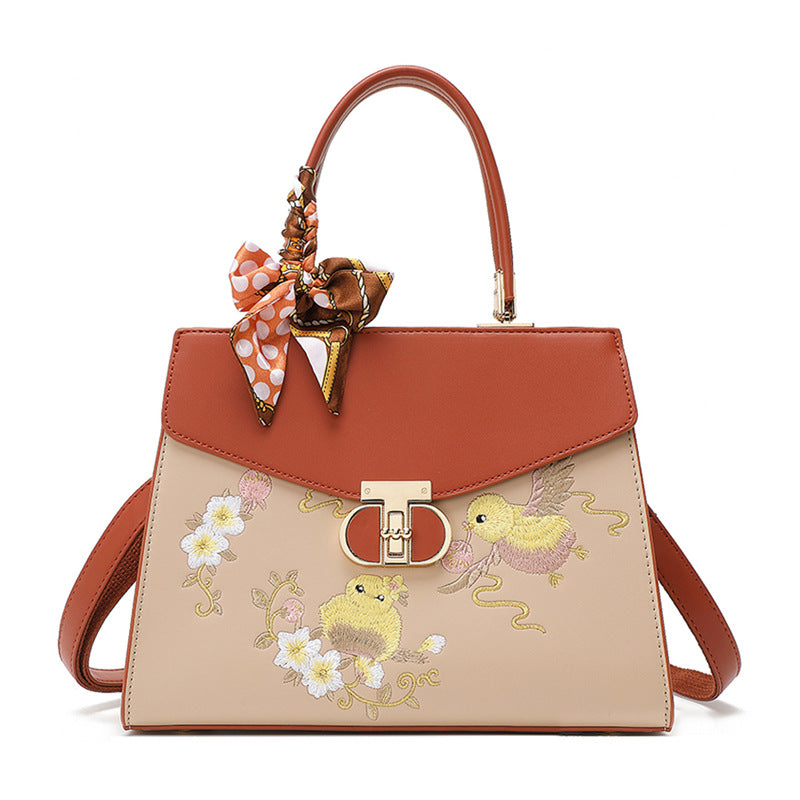 Damen Handtasche mit floraler Stickerei und modischem Schal Nord Taschen