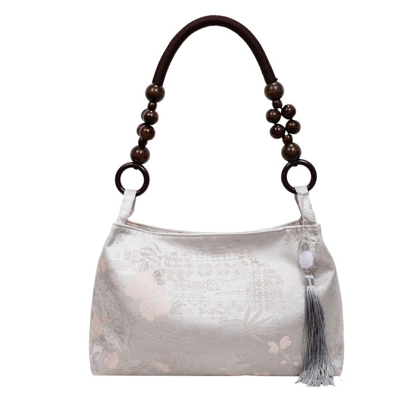 Damen elegante Umhängetasche mit einzigartigem Blumenmuster und modischen Holzgriffen Nord Taschen