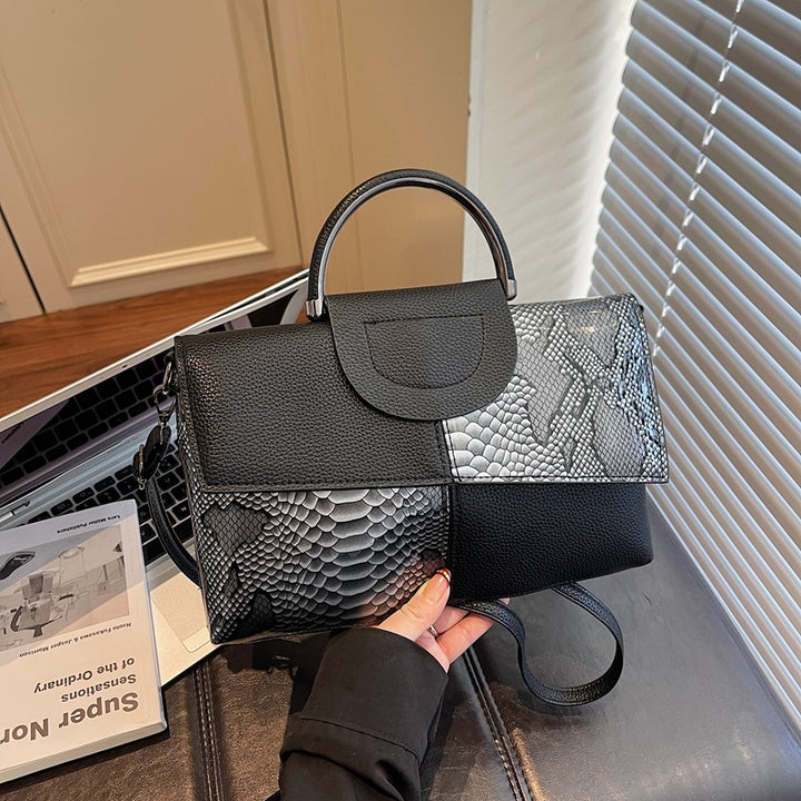 Damen elegante Umhängetasche im modernen Schlangenleder-Look Nord Taschen